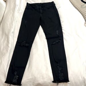 Buckle Flying Monkey black skinny jeans. Stretch. Size 25. 26 inch inseam.